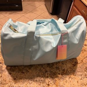 Stoney Clover Lane light blue duffel bag with strap